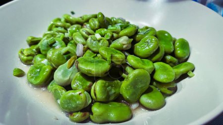 Photo for A closeup shot of the marinated fava beans in a plate - Royalty Free Image