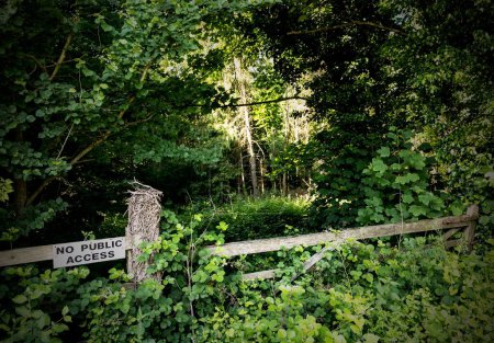 Photo for A 'No Public Access' by a wooden gate leading to a wood on Akeman Street, Oxfordshire - Royalty Free Image