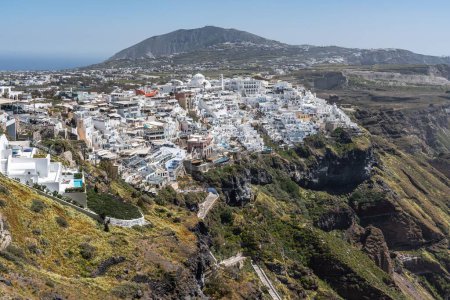 Photo for The stunning cityscape of Fira, the main town of Santorini overlooking the caldera in Greece - Royalty Free Image