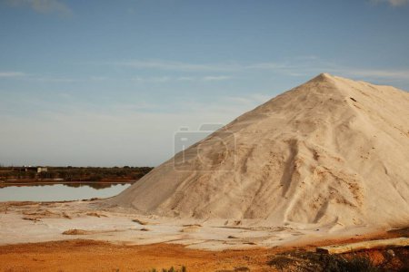 Photo for A number of Faro salt flats where sea salt is made and harvested in a rural area - Royalty Free Image