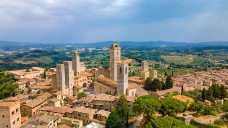 An aerial view of the San Gimignano Torre Grossa with a blue sky in the background, Italy, Tuscany