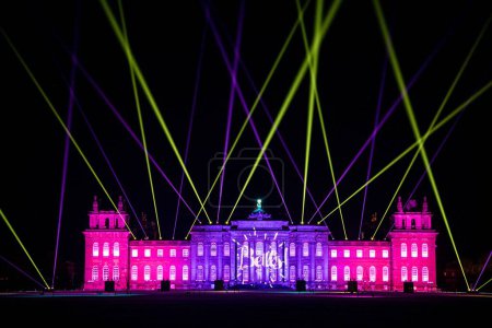 Photo for A view of Blenheim palace illuminated with Christmas lights at night - Royalty Free Image