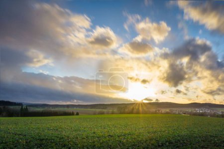 Photo for A beautiful bright sunny sky over a rural green valley - Royalty Free Image