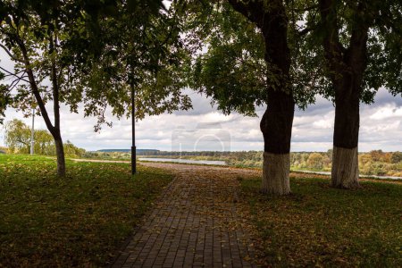 Photo for A closeup of a path through the park leading to the river embankment in Gomel - Royalty Free Image