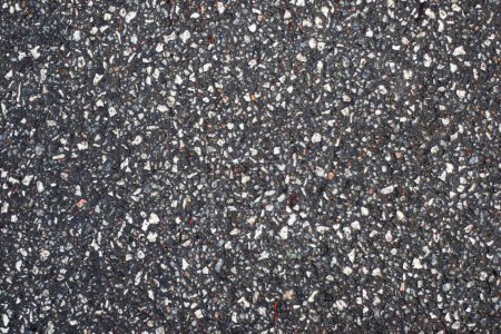 Foto de Un primer plano de un suelo de asfalto moteado - perfecto para fondos de pantalla - Imagen libre de derechos