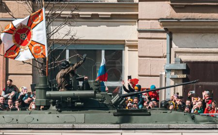 Photo for A scenic view of Russian Army Soldiers on Tanks waving at people - Royalty Free Image