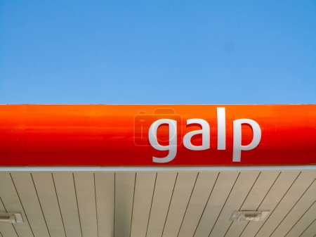 Photo for The Galp brand gas station roof with blue sky in the background in Barcelona, Spain - Royalty Free Image