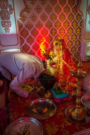Photo for A man praying before an idol of Goddess Durga at a Mandal in Mumbai for the auspicious Indian festival of Navratri - Royalty Free Image