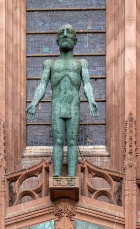 Photo for A vertical shot of Risen Christ statue over the west door of Liverpool Cathedral - Royalty Free Image