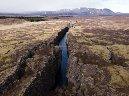 An aerial drone shot of the scenic rift valley in Thingvellir, Iceland