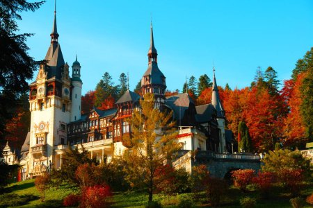 Photo for The beautiful Peles Castle (Castelul Peles) in Sinaia, Romania with autumn trees - Royalty Free Image