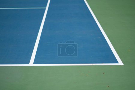 Photo for The right sideline of a blue tennis court with white lines, concept of a tennis match - Royalty Free Image