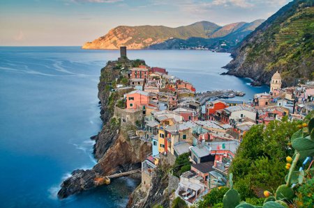 Photo for The colorful building of the Vernazza town in Cinque Terre Italy surrounded by the calm sea - Royalty Free Image