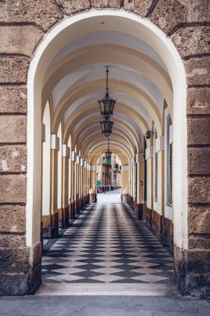 Photo for A vertical shot of a corridor with arches - Royalty Free Image