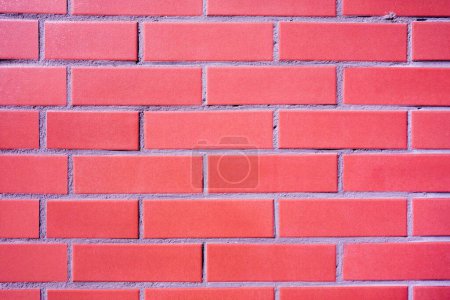 Foto de Un arreglado en filas aseadas de ladrillos rojos - fondo de pantalla perfecto - Imagen libre de derechos