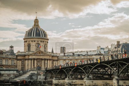 Photo for A scenic shot of Pont des Arts and French Academy in the background - Royalty Free Image