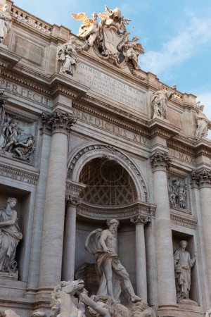 Photo for A vertical shot of Trevi Fountain of Rome with blue cloudy sky - Royalty Free Image