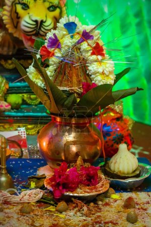 Photo for A vertical shot of a Kalash on an altar at a temple - Royalty Free Image