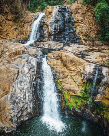 The beautiful scene of small waterfalls, Perez Zeledon, Costa Rica, vertical