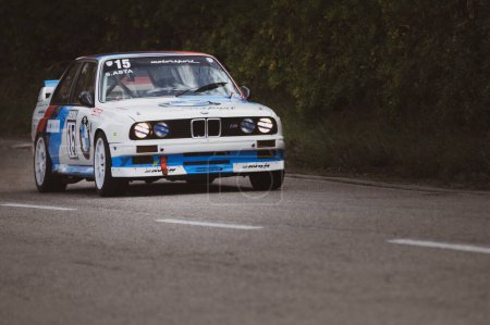 Photo for A white car set up during an uphill speed race of the Italian championship in Pesaro - Royalty Free Image
