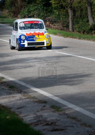 Photo for A blue and white car set up during an uphill speed race of the Italian championship in Pesaro - Royalty Free Image