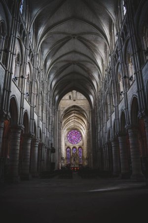 Photo for A low angle of indoorws inside of Laon Cathedral, France with long corridor with arch gates - Royalty Free Image