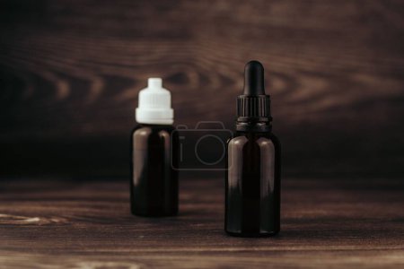 Photo for A closeup of CBD oils in brown glass bottles - Royalty Free Image