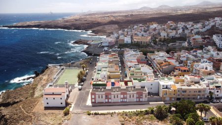 Photo for A drone shot of La Jaca town with sea view in Tenerife, Canary Islands, Spain - Royalty Free Image