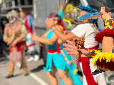 Photo for A closeup of hundreds marching during the 1st Annual Indigenous Peoples of America's Parade - Royalty Free Image