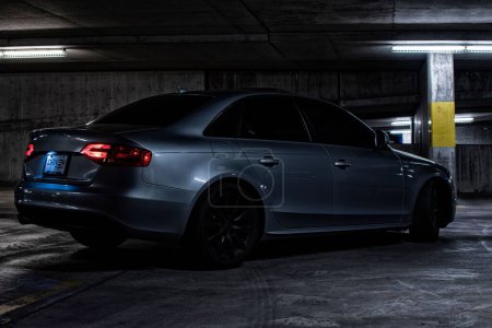 Photo for A side view of an Audi S4 in a parking garage - Royalty Free Image