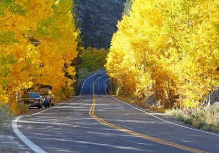 Photo for A road with scenic autumn landscape on the background in California - Royalty Free Image