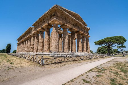 Photo for The ancient doric colonnades of the first Hera Temple of Paestum, Campania, Italy, side view - Royalty Free Image