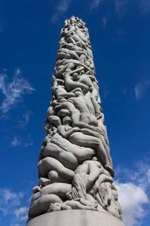 Photo for The modern sculptures of Vigeland park, Oslo, Norway, vertical, low angle - Royalty Free Image