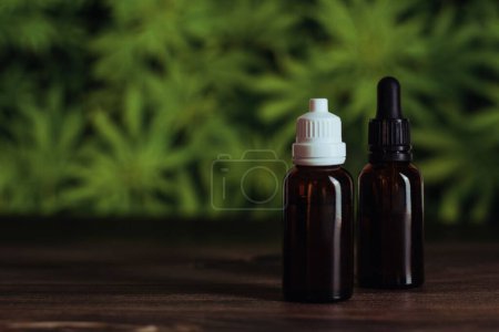 Photo for A closeup of CBD oils in brown glass bottles - Royalty Free Image