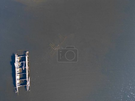 Photo for A top view of the wrecks of a ship in the sea - Royalty Free Image