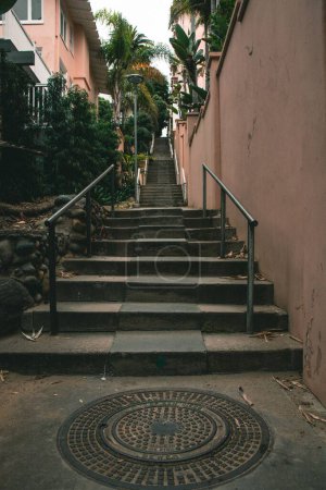 Photo for A vertical shot of a staircase between buildings in San Diego, California, United States - Royalty Free Image