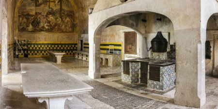 Photo for An image of a kitchen with a stone table in Certosa di Padula, Campania, Italy - Royalty Free Image