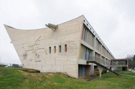Photo for The decorated exterior of Maison of the Culture  Le Corbusier, Cultural center with light sky - Royalty Free Image