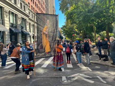 Photo for A closeup of hundreds marching during the 1st Annual Indigenous Peoples of America's Parade - Royalty Free Image