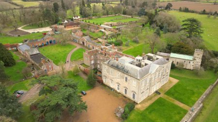 Photo for An aerial view of the historic Claydon House in the Aylesbury Vale, Buckinghamshire, England - Royalty Free Image