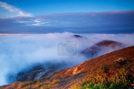 Photo for A low fog on the Marin headlands in San Francisco Bay in California at sunset - Royalty Free Image