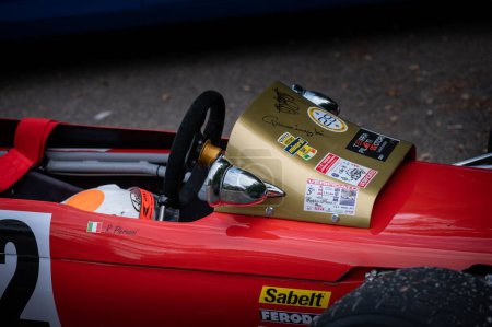 Photo for A closeup of the details of red car set up during an uphill speed race of the Italian championship in Pesaro - Royalty Free Image
