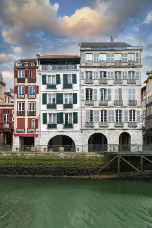 Photo for Bayonne in the pays Basque, colorful facades on the river Nive - Royalty Free Image