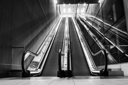 Photo for A grayscale shot of escalators - Royalty Free Image