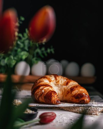 Photo for A vertical selective focus view of a freshly baked croissant - Royalty Free Image