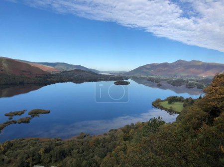 Photo for A landscape of Surprise View lake with trees with blue cloudy sky in Borrowdale, England - Royalty Free Image