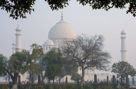 Photo for A scenic shot of the Taj Mahal on a misty day in Agra, Uttar Pradesh, India - Royalty Free Image