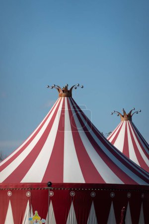 Photo for An aerial view of red and white circus tents with crowns - Royalty Free Image