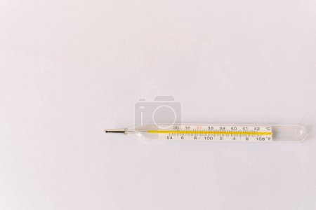 Photo for Thermometer isolated on white. Fever diagnostic and healthcare concept - Royalty Free Image