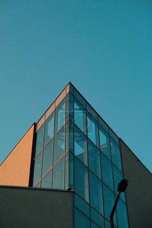 Photo for An exterior of glass building against a blue sky in Itzling, Salzburg - Royalty Free Image